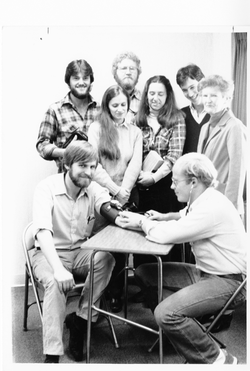 COM students practice taking blood pressure readings