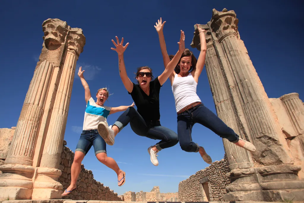 college students at roman ruins in Morocco