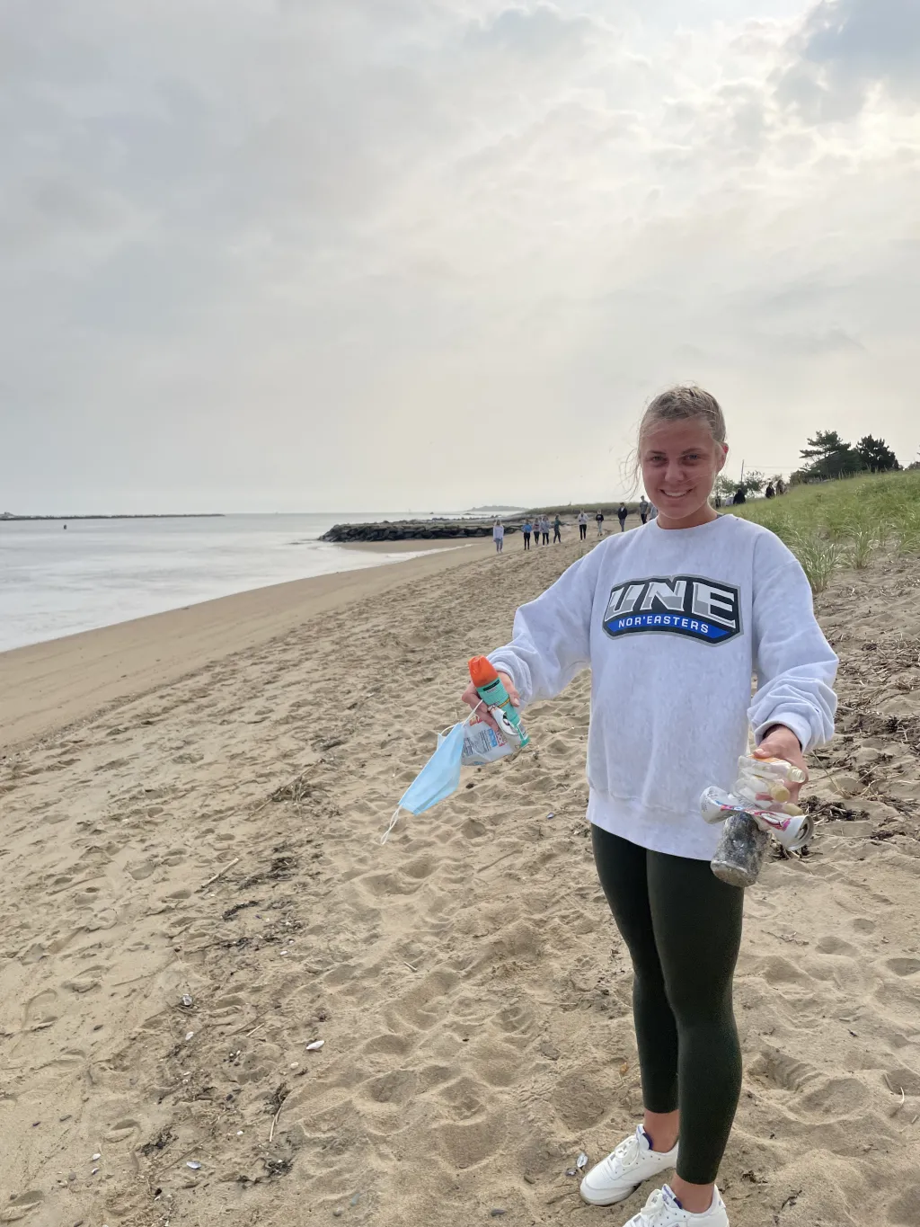 Student collecting trash