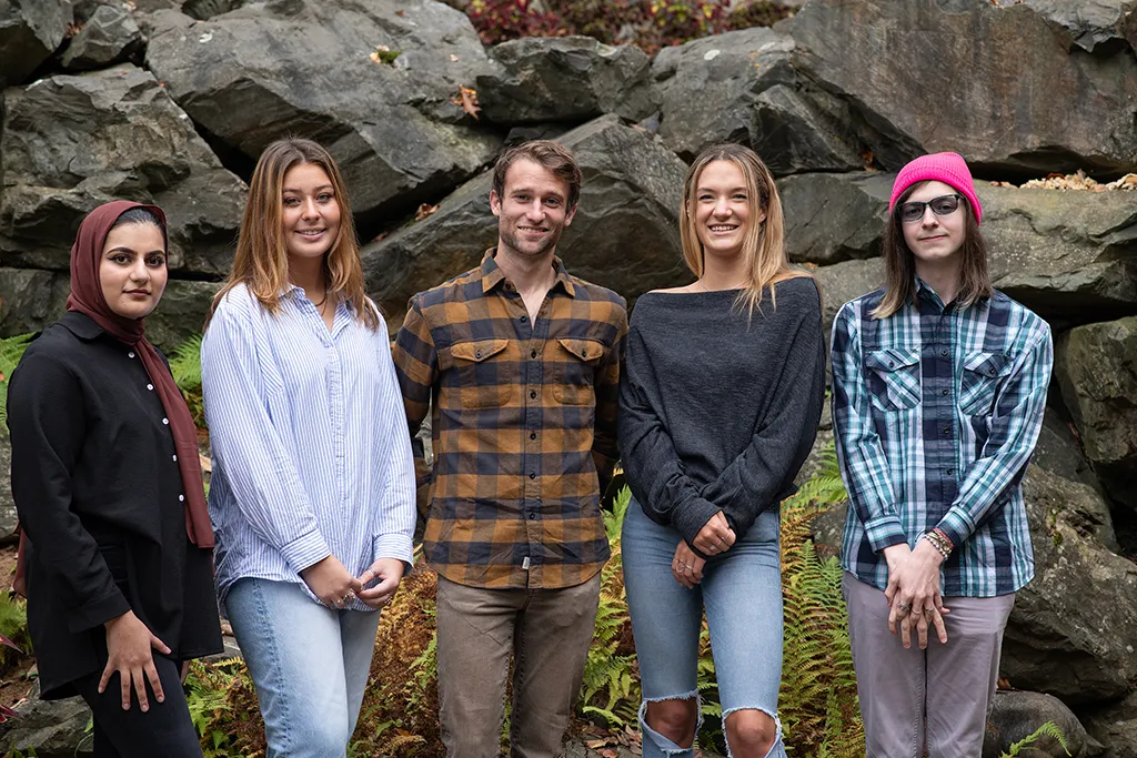 The five Shaw Senior Fellows standing in a line