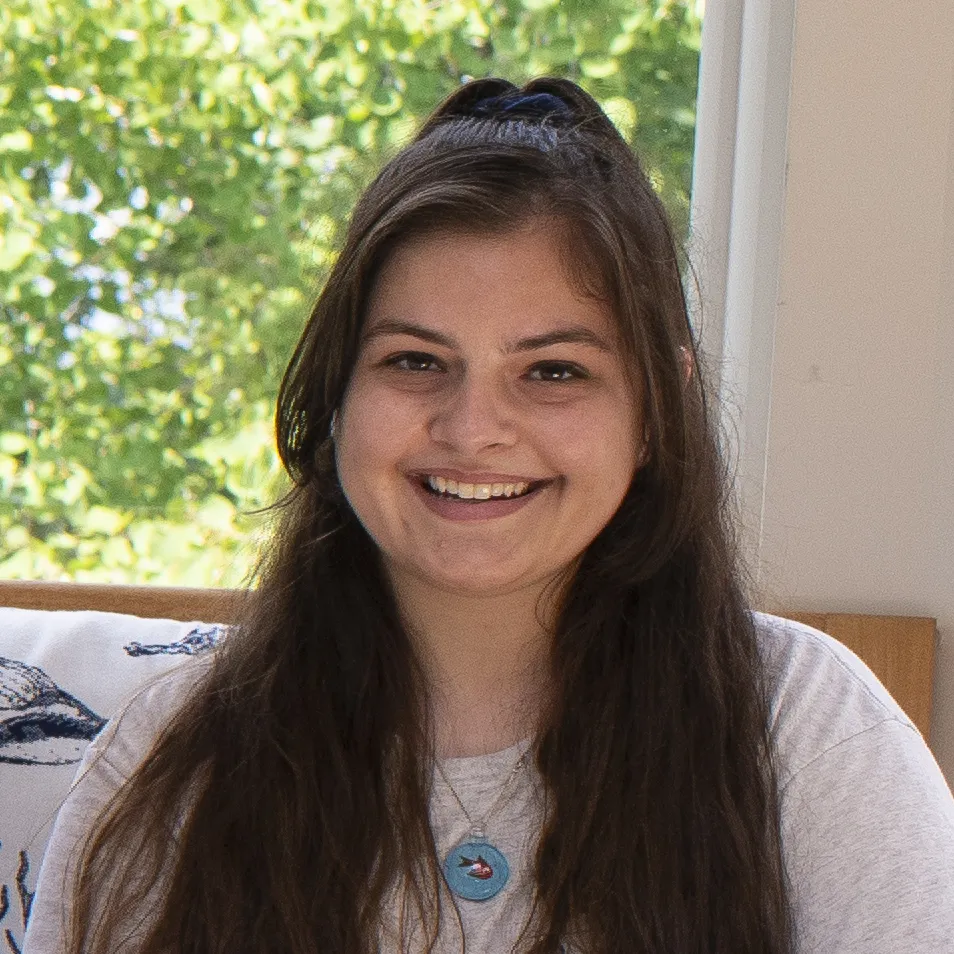 Headshot of U N E student Dominique Mellon
