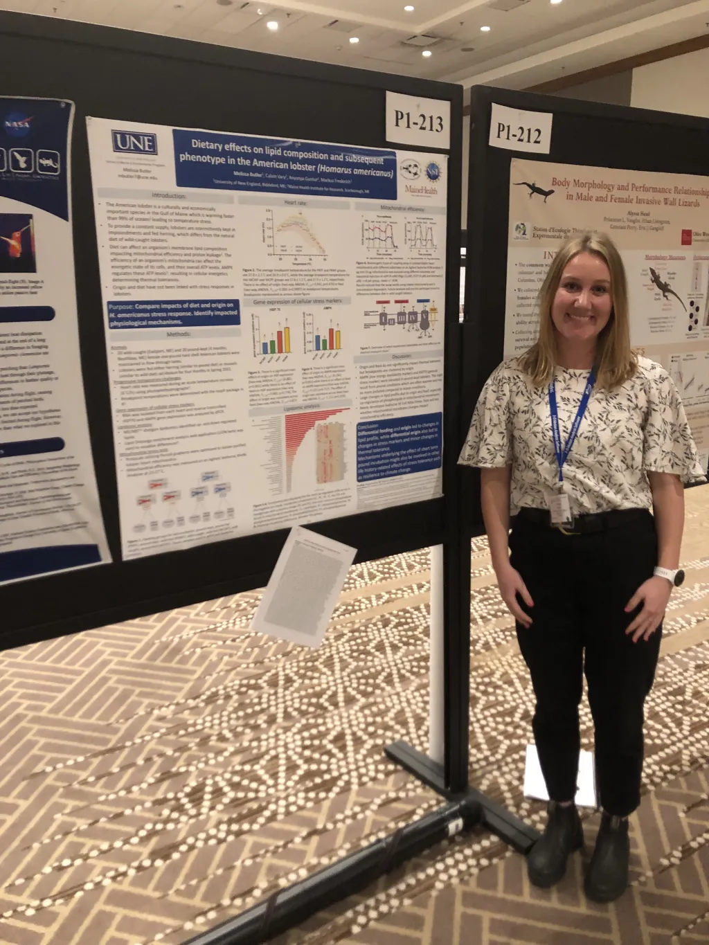 Melissa Butler poses with her poster