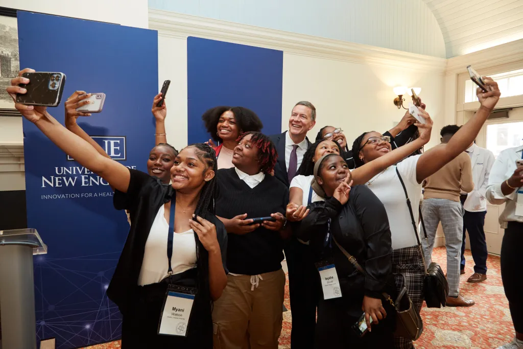 Cheyney University students take selfies with President James Herbert