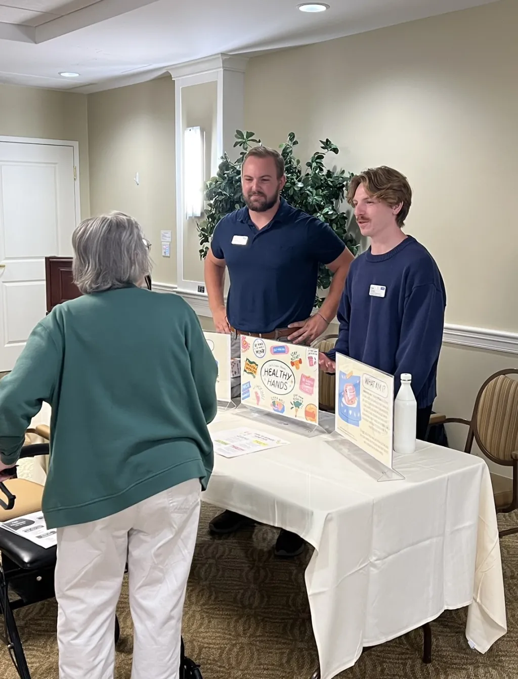 OT students talk with a Park Danforth resident