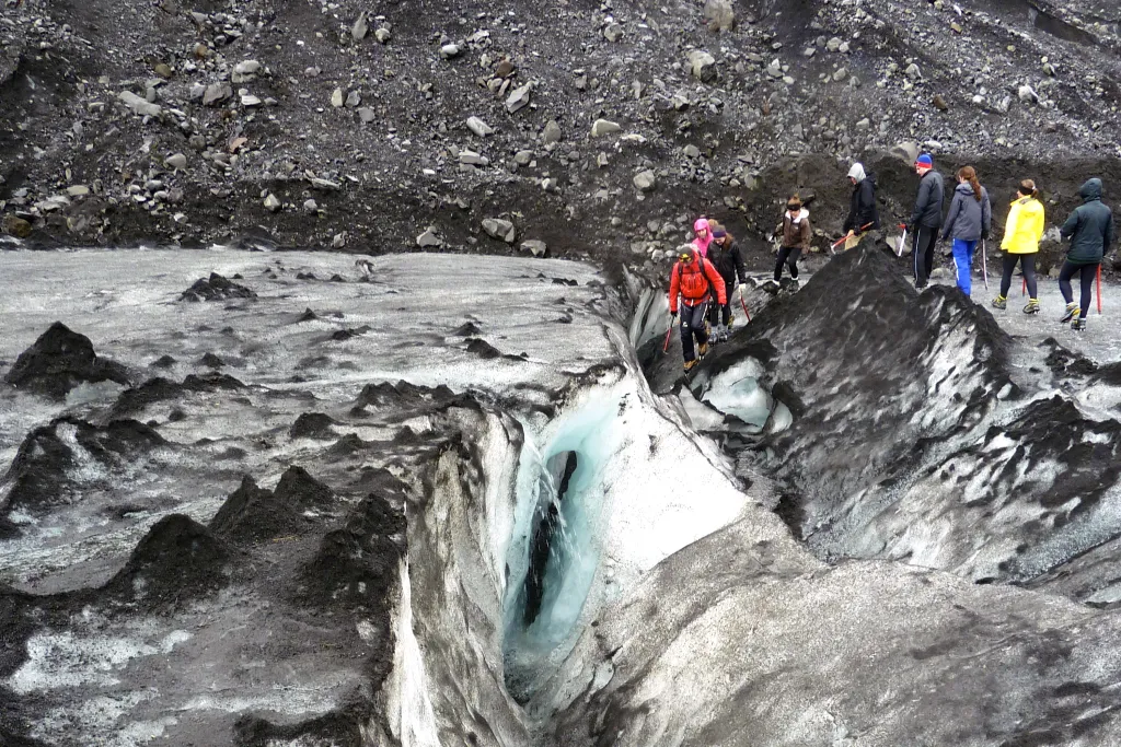  Faculty and students hike Sólheimajökull glacier