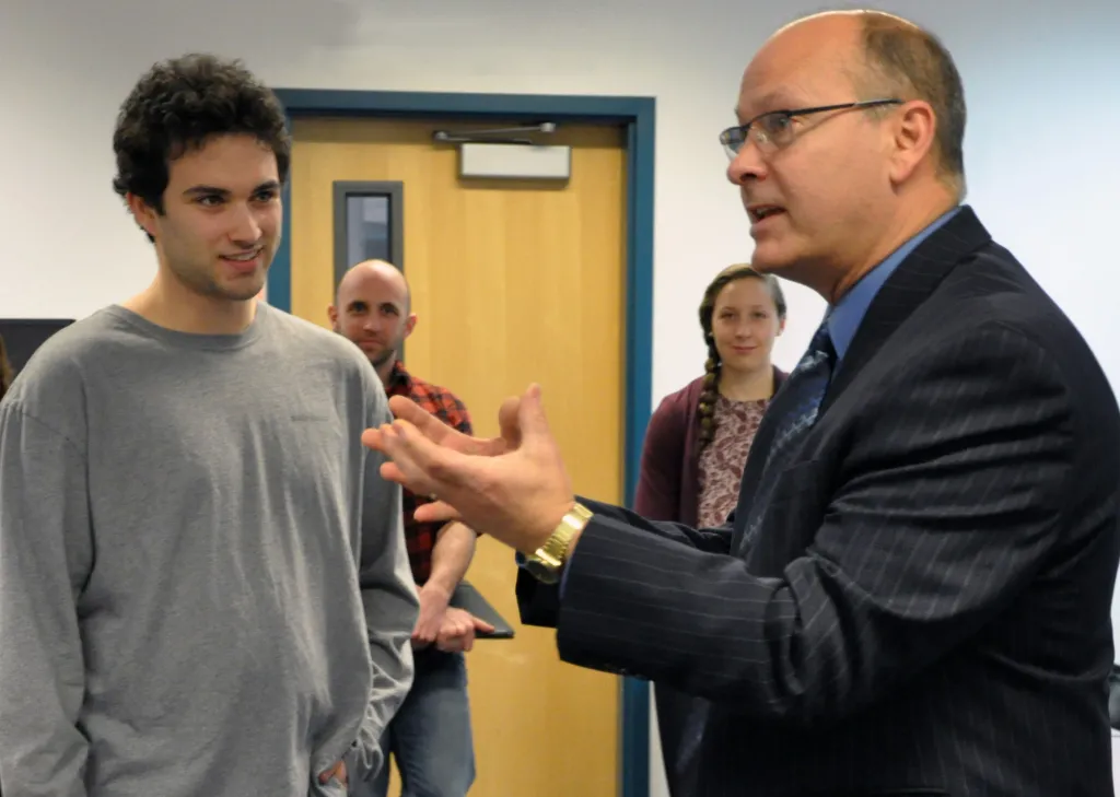 Matthew Scheuer (left) and Tom LeBlond discuss Scheuer's Pratt & Whitney Fellowship research.