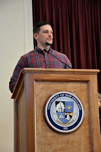 Matthew D'Elia speaks at the white coat ceremony for the DPT Class of 2017