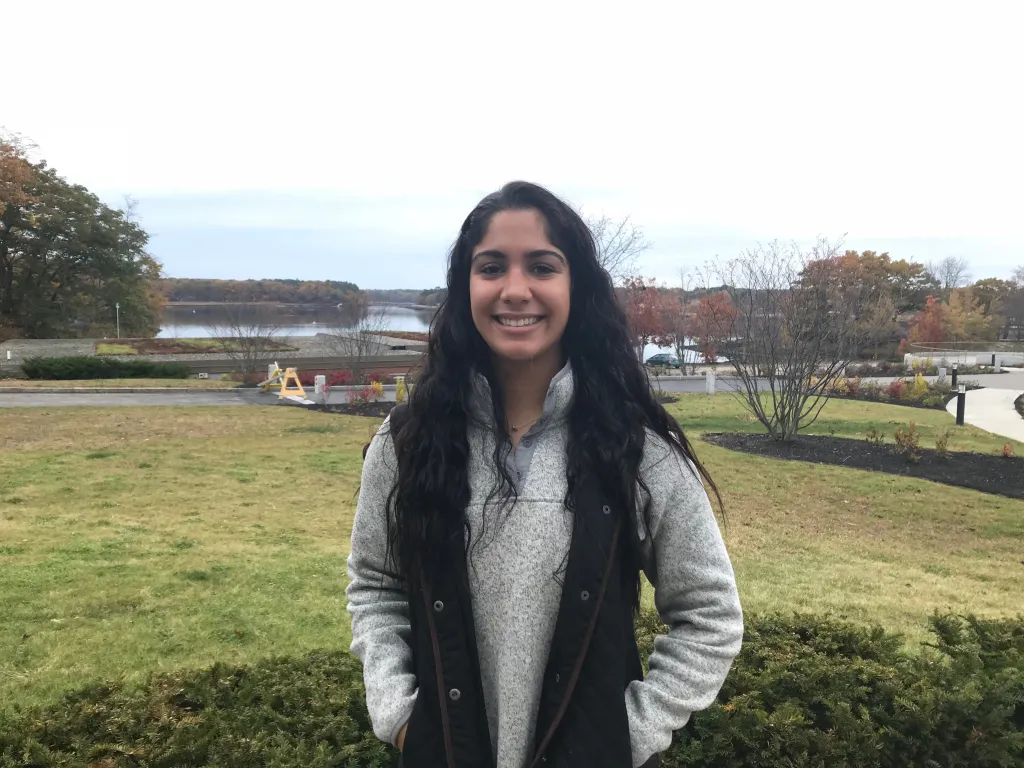 Andrea Gosper is a huge football fan. She's also an athlete on the UNE women's softball team.