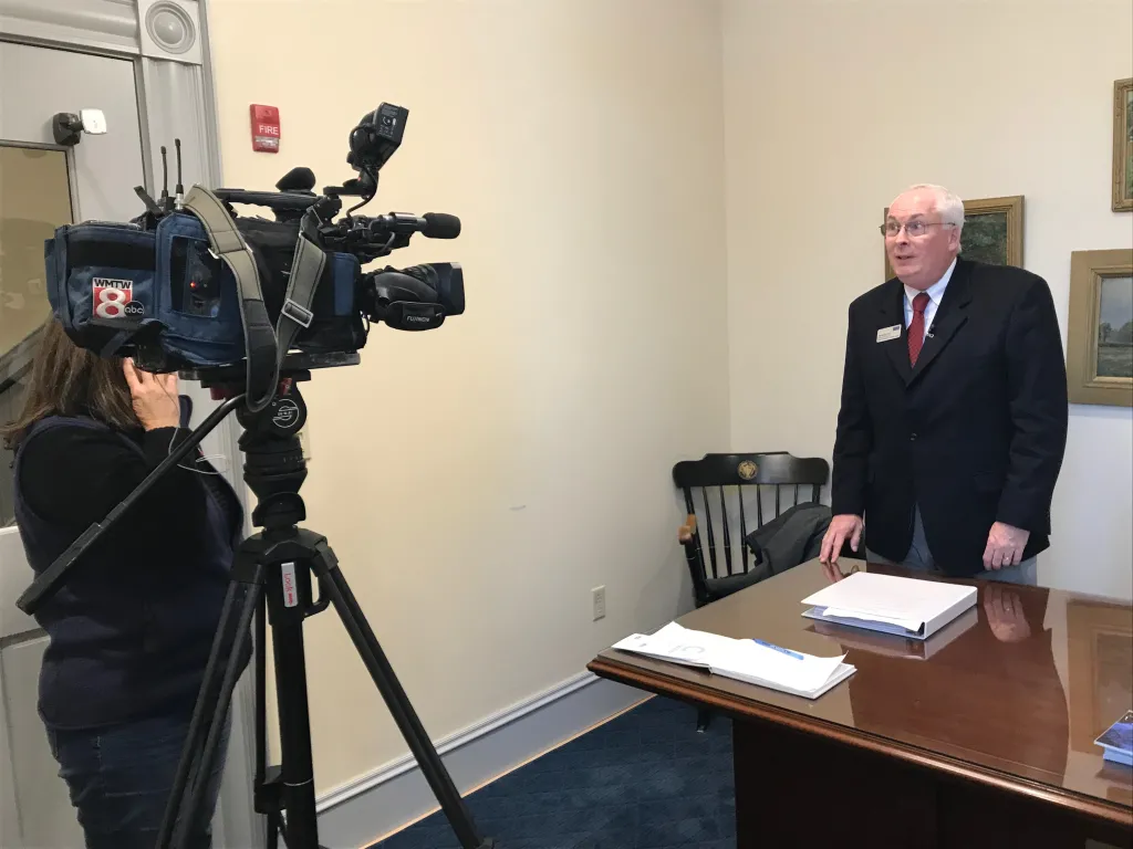 Tom Meuser being interviewed by WMTW
