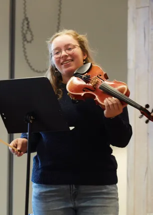 A student plays the violin