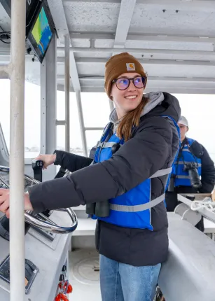 Student Johanna Birchem pilots a UNE research vessel