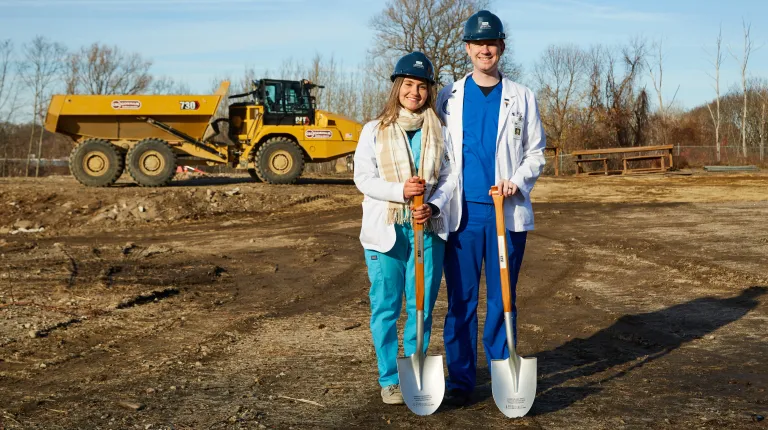 COM students pose with shovels at the groundbreaking ceremony