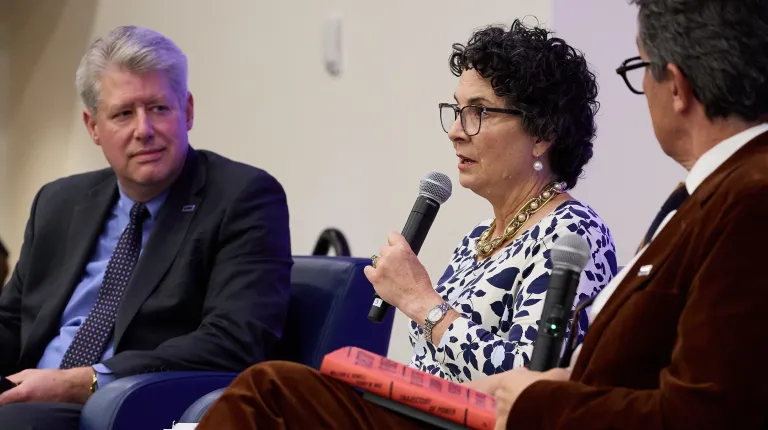 UNE Dean Emerita Jeanne A.K. Hey moderates the discussion