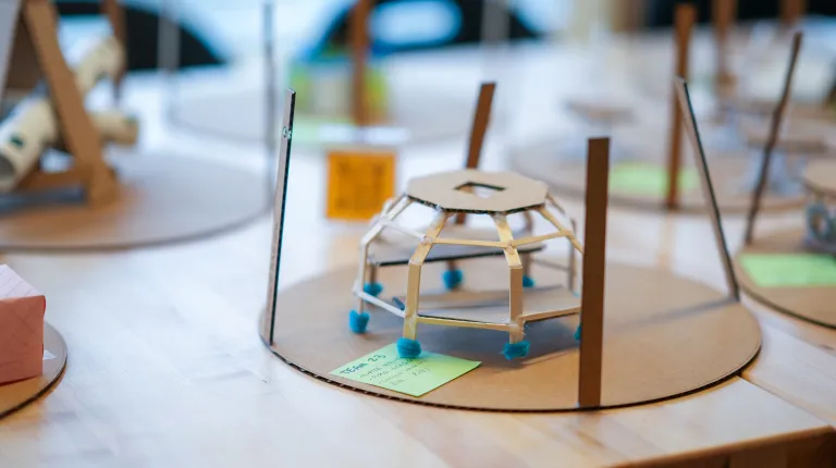 A device created by a UNE student made from wood