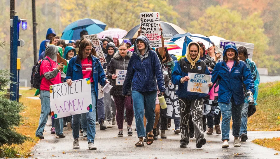 A group of U N E students at a Women's March