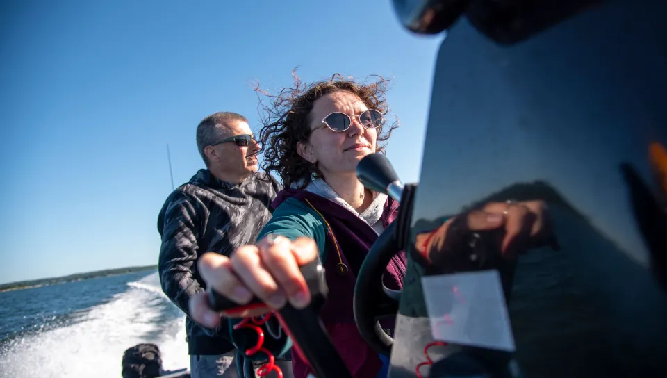 Regina Dyer pilots a boat in Casco Bay
