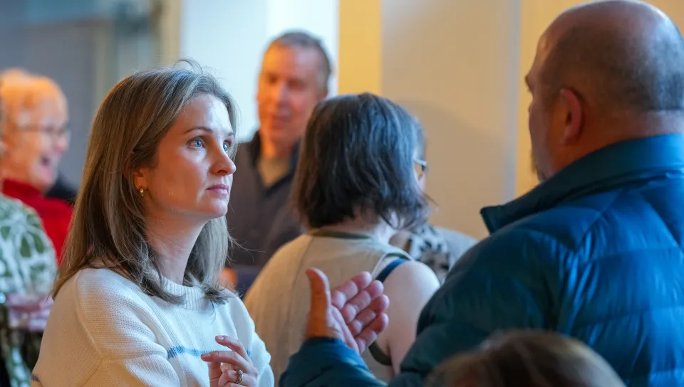 people at the Authors event chatting