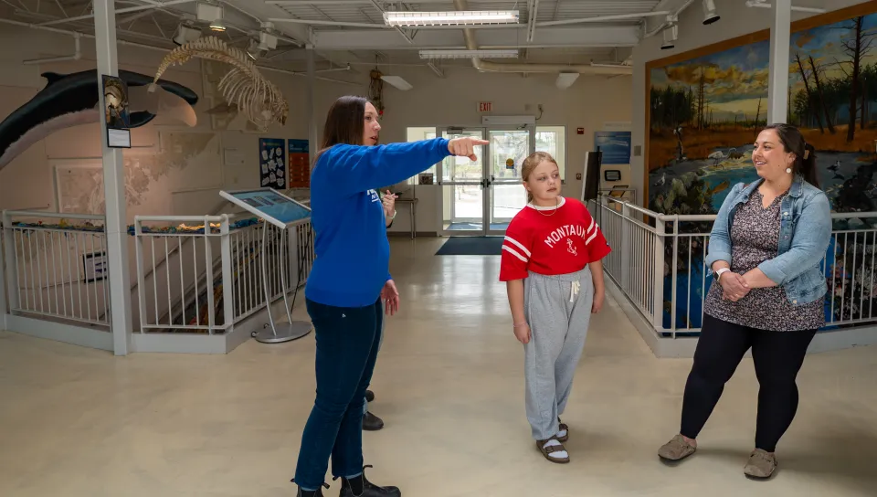Assistant Professor Tricia Thibodeau and third-year marine science major Piper Stagg took time to lead a private tour of the Arthur P. Girard Marine Science Center for a 10-year-old aspiring researcher, carrying on a legacy of discovery throughout the next generation of scientists.