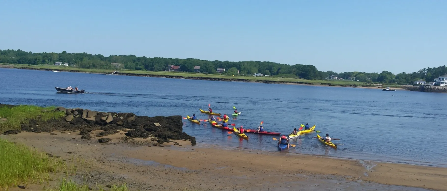 Students in UNE's Early College Program kayak in the Saco River.