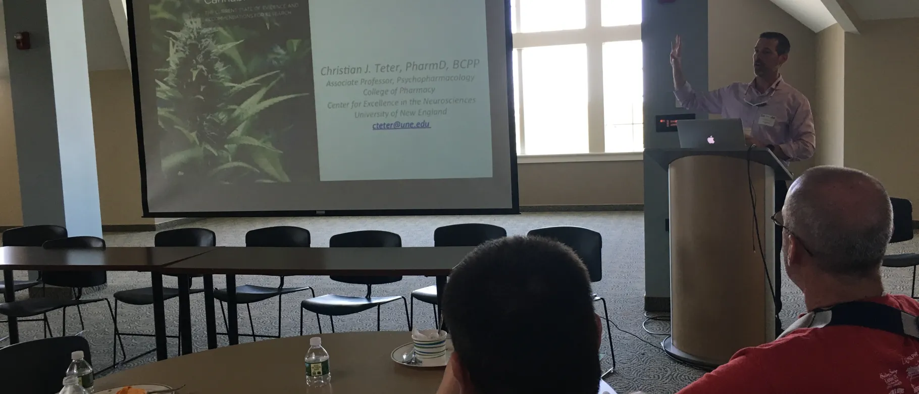 Associate Professor Christian Teter from the UNE College of Pharmacy gives a presentation about marijuana and the teen brain