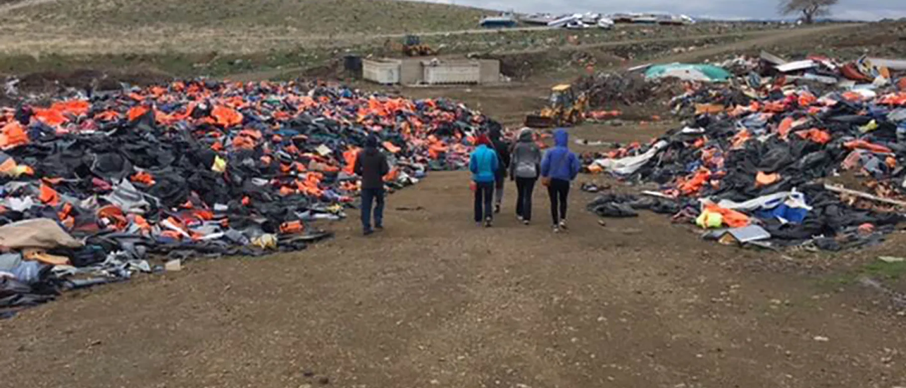 UNE students walk through the "lifejacket graveyard" on the Greek island of Lesbos