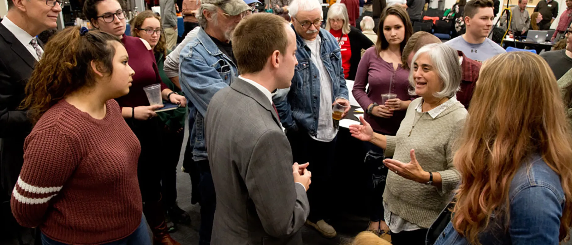 Senator Eric Brakey speaks with UNE School of Social Work Director Shelley Cohen Konrad