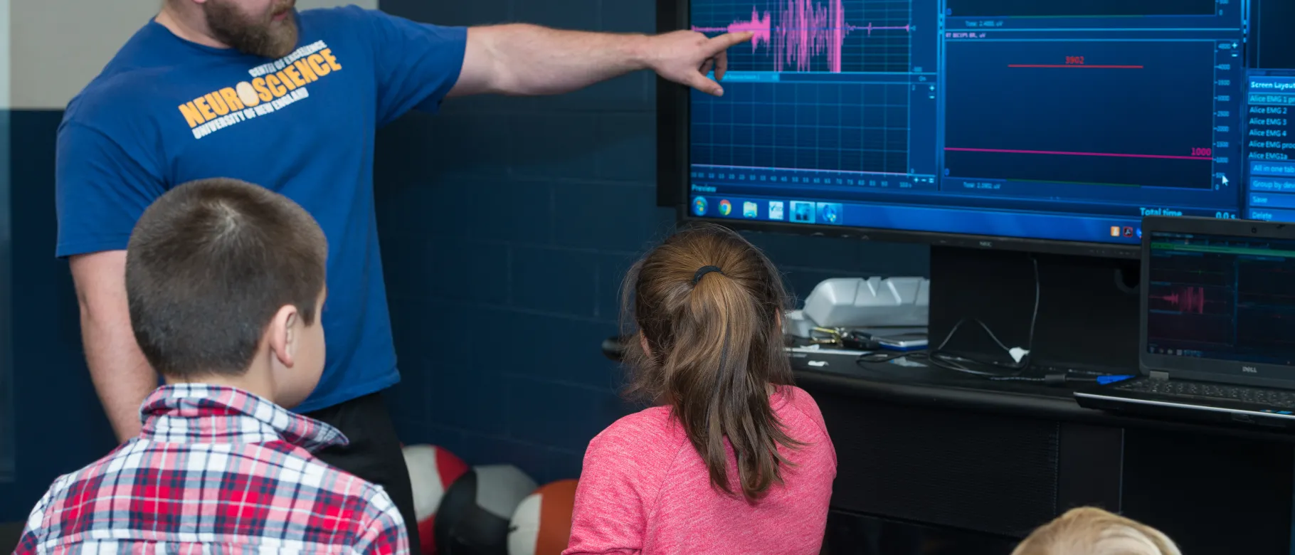UNE's Mike Lawrence leads an exhibit at the Brain Fair