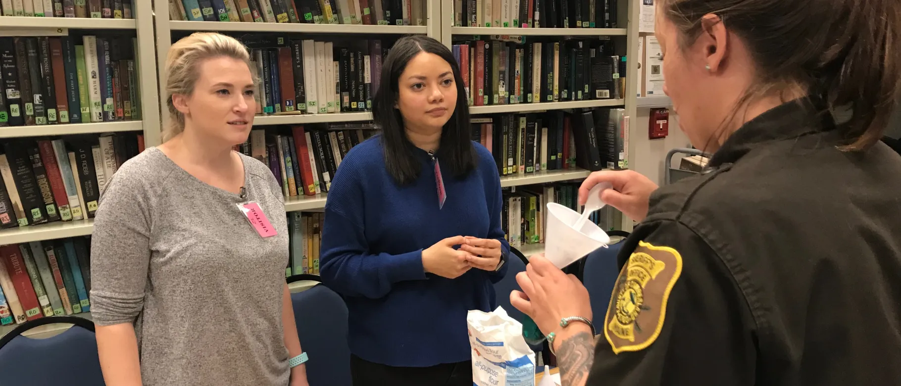 Students Suzanne Winter and Kelly Pitre take a jail employees through a stress relief exercise
