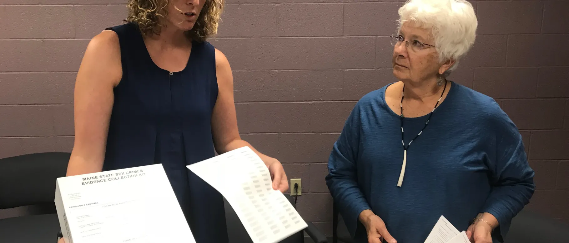Emily Hilton and Polly Campbell display the sexual assault kit nurse examiners use 