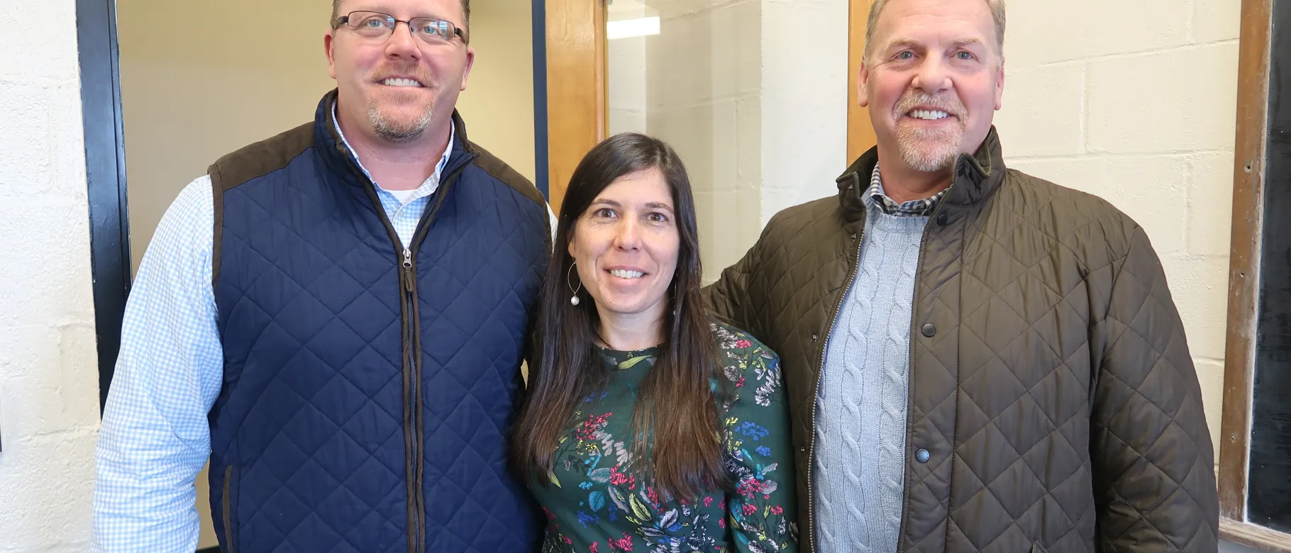 Former members of the Portland Pirates' management team Brad Church and Ron Cain with Aimee Vlachos