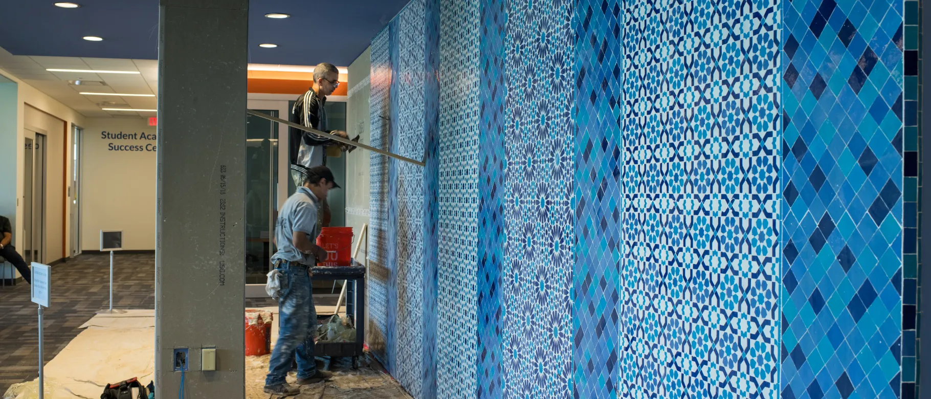 UNE unveils authentic Moroccan tile wall on Biddeford Campus