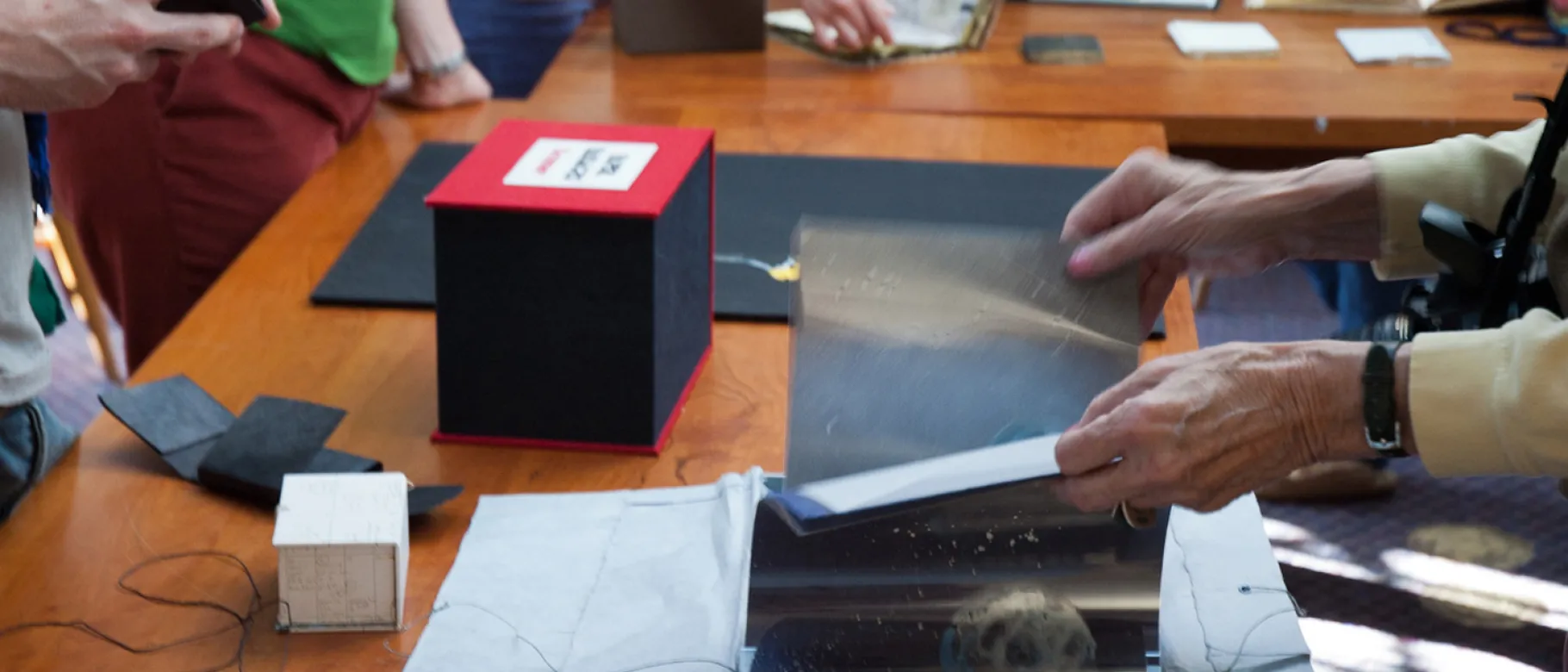 Photo of people exploring artist's books