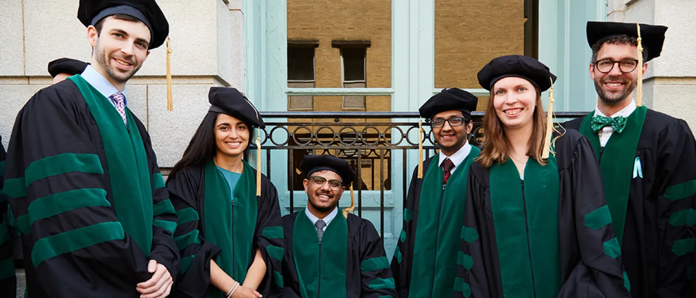 UNE COM students post for a photo outside Merrill Auditorium in Portland