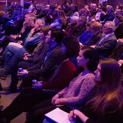 Community members attend a C G H lecture