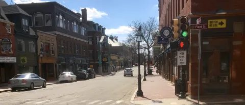 An empty street illustrates the effects that COVID-19 has had on local businesses and communities across the United States.