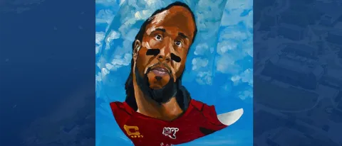 A painting of a football player over a blue backdrop