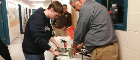 AALSO professional teaches Liam Sullivan about heat welding