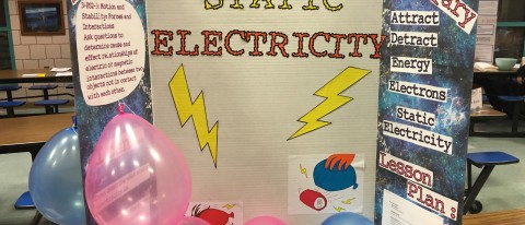 A static electricity learning station, created by UNE education students Summer McGowan and Jessica Loverdi, was one of 12 stati