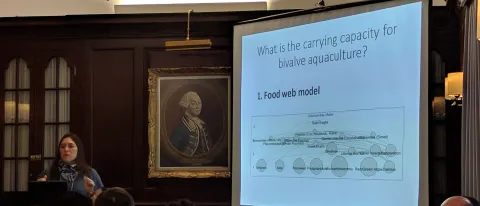 Carrie Byron gives a presentation at the Northeast Aquaculture Conference and Exposition on detritus on mussel or oyster farms