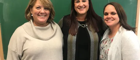 Krysten Gorrivan with Maine Teacher of the Year Heather Whitaker and Brooke Proulx of UNE's Master of Social Work program