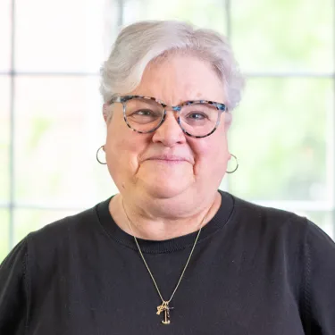 Headshot of Kris Winston