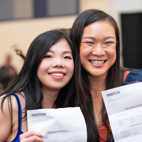 Two female students celebrate their residency matches