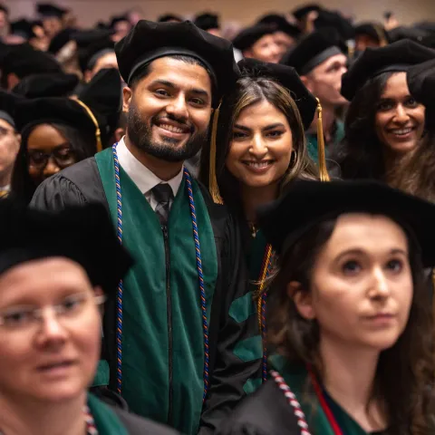 Hammad and Hafsa Sadiq smile at graduation