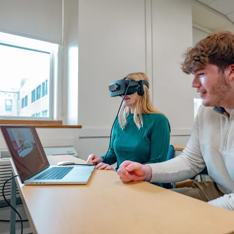 Students use a VR headset for a classroom activity